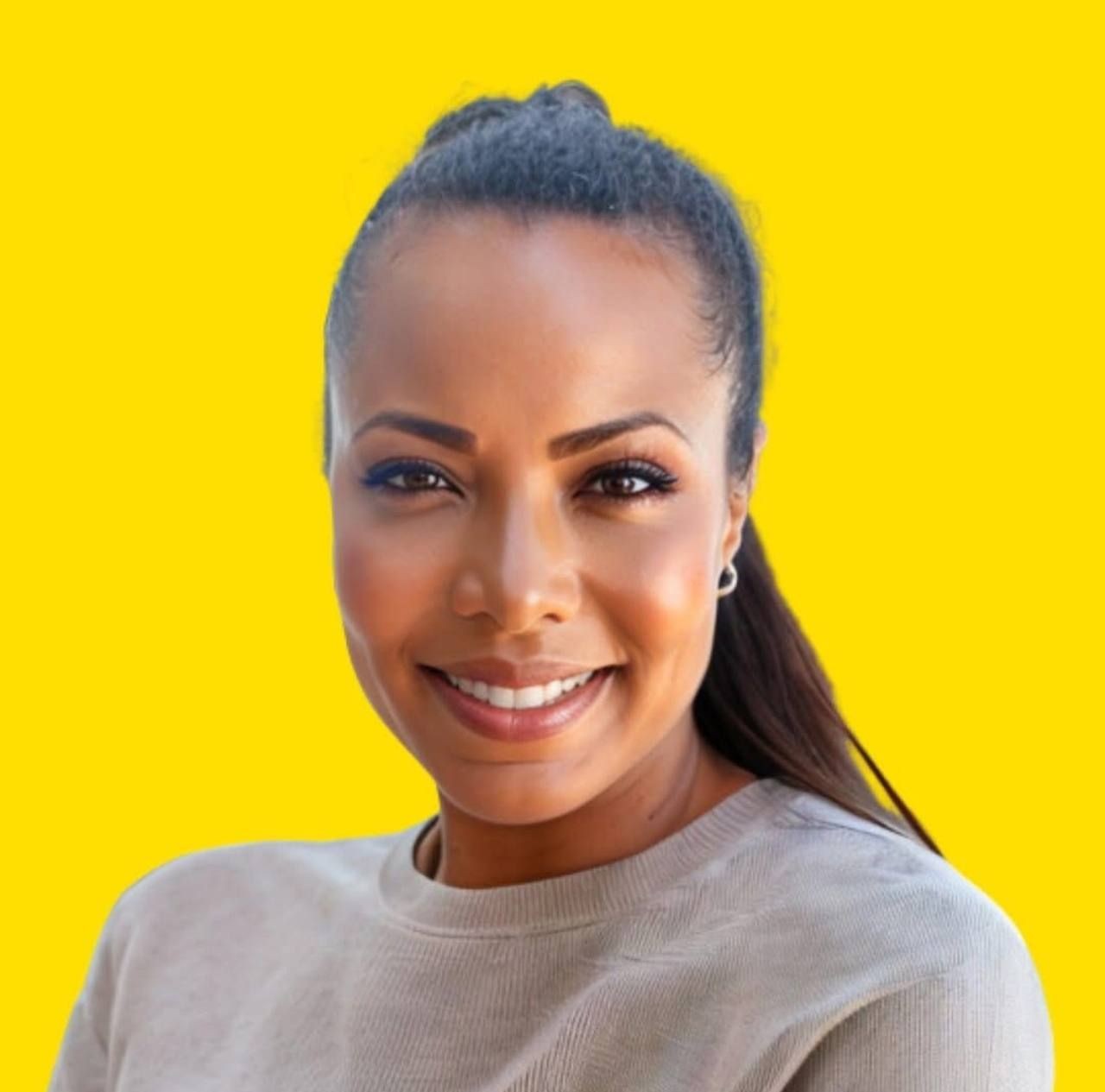 Smiling person with long hair in a ponytail against a bright yellow background.